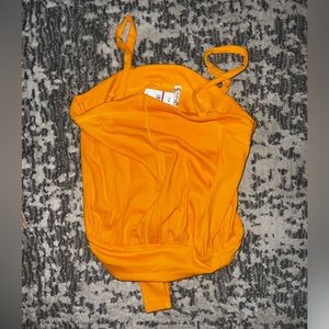 NWT XS tangerine Free People bodysuit